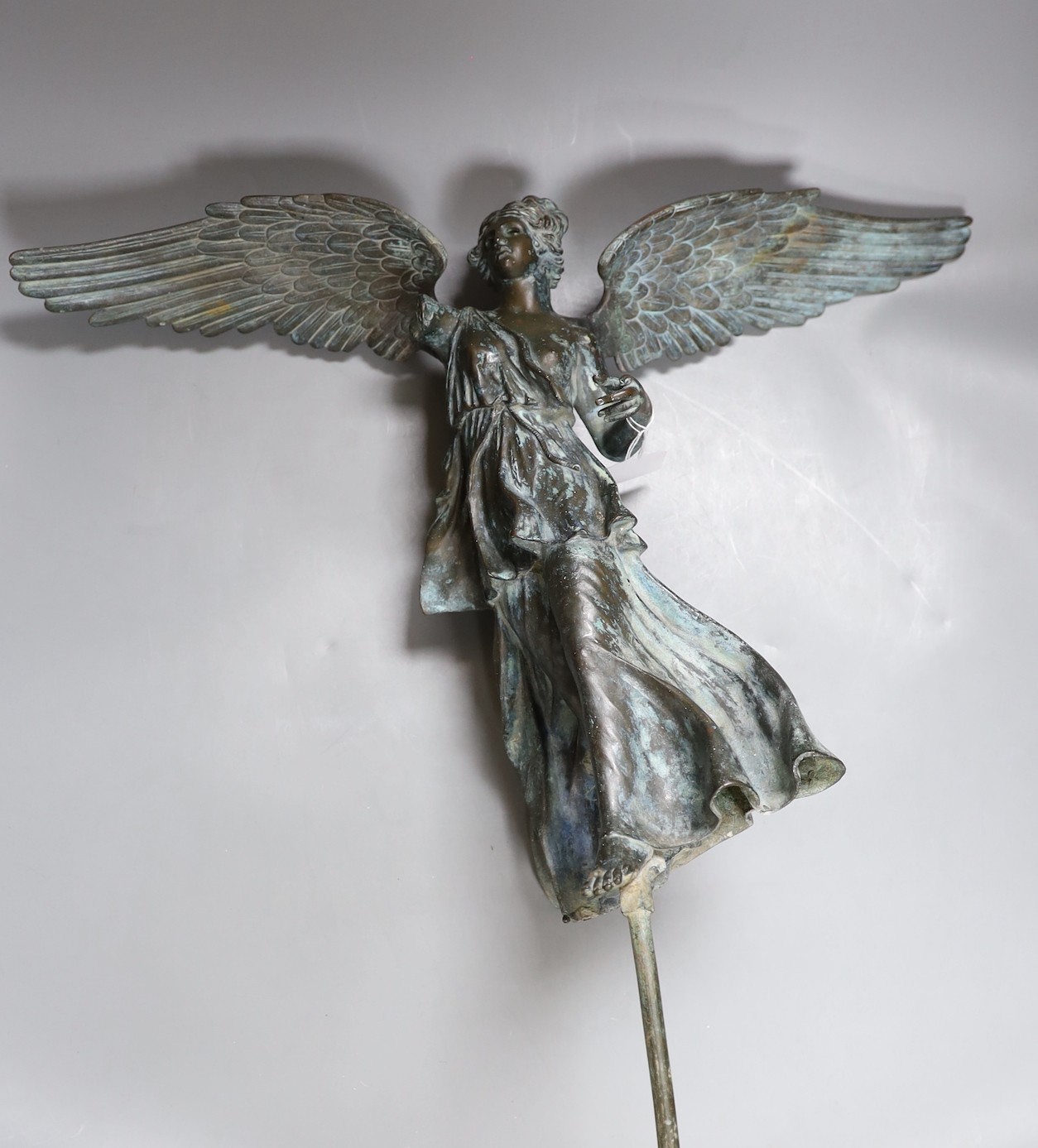 Weathered bronze, winged garden figure, 52 cms high